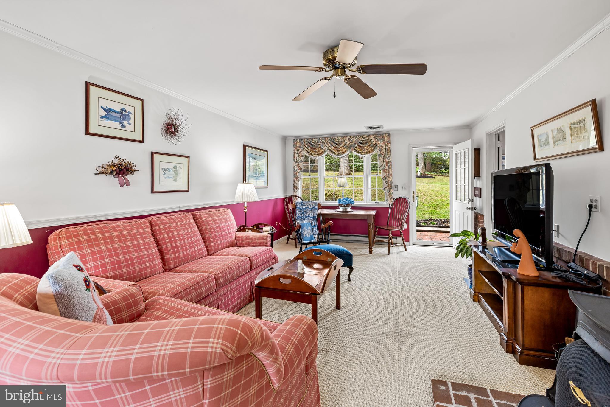 200 Purlington Road Lutherville-Timonium, MD 21093 - Photo 16 of 50 a living room with furniture and a flat screen tv