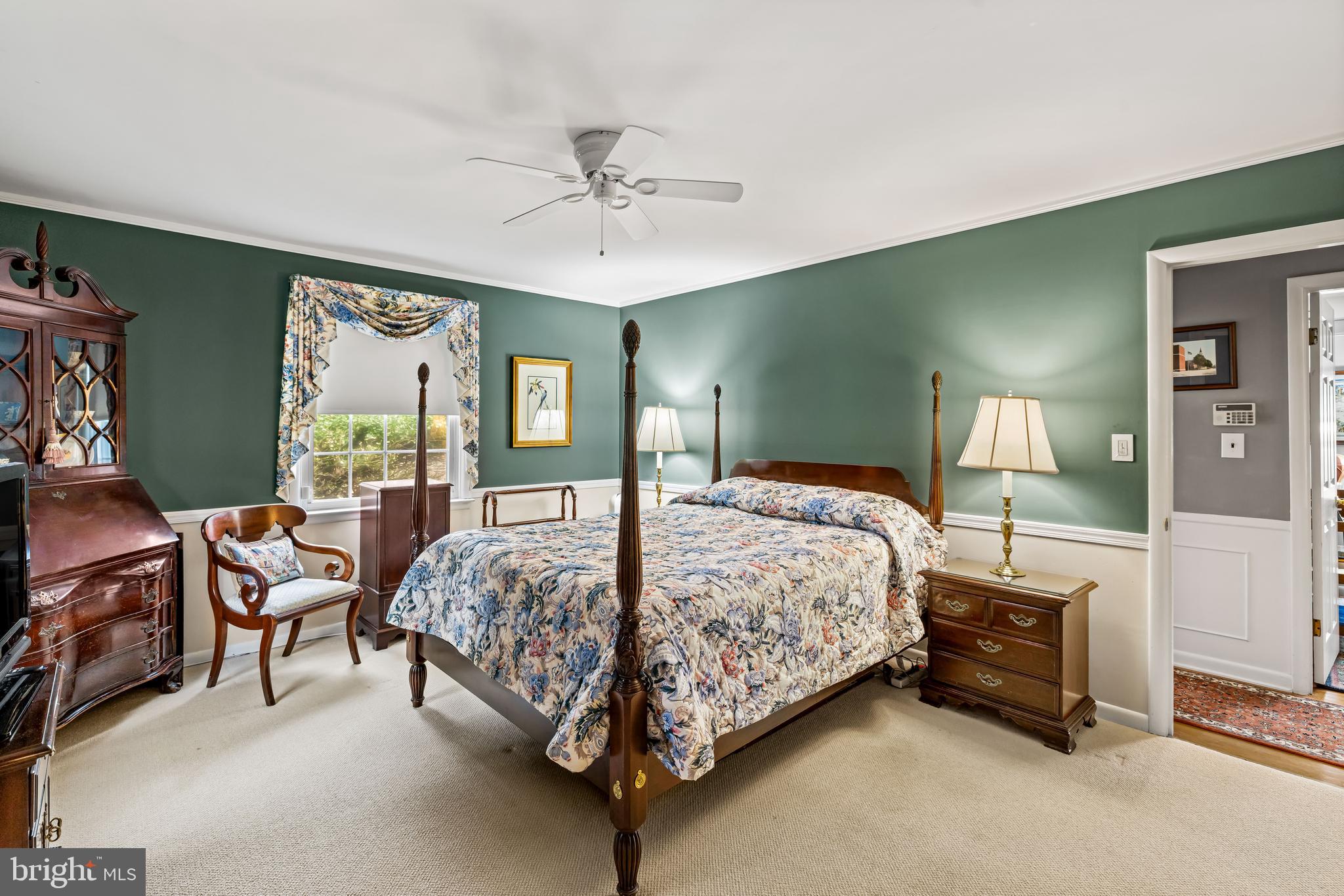 200 Purlington Road Lutherville-Timonium, MD 21093 - Photo 25 of 50 a bedroom with a bed and a chandelier
