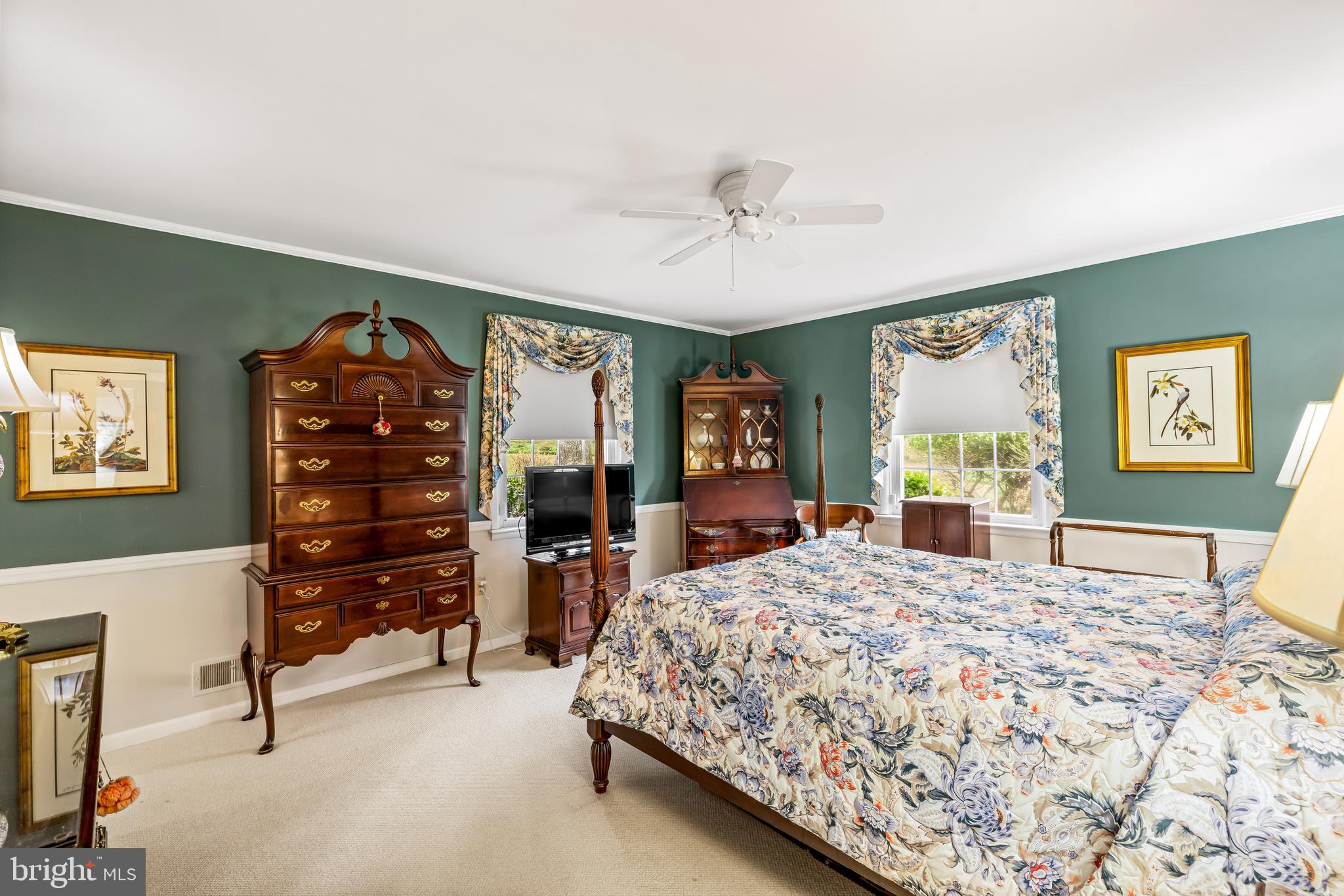 200 Purlington Road Lutherville-Timonium, MD 21093 - Photo 26 of 50 a bedroom with a bed and a flat tv screen on dresser