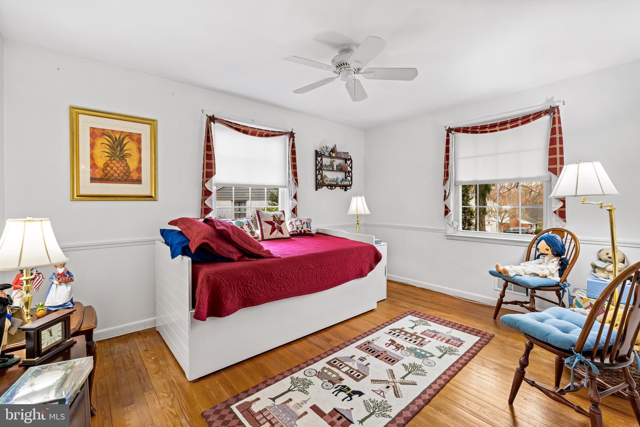 200 Purlington Road Lutherville-Timonium, MD 21093 - Photo 30 of 50 a bedroom with a bed and wooden floor