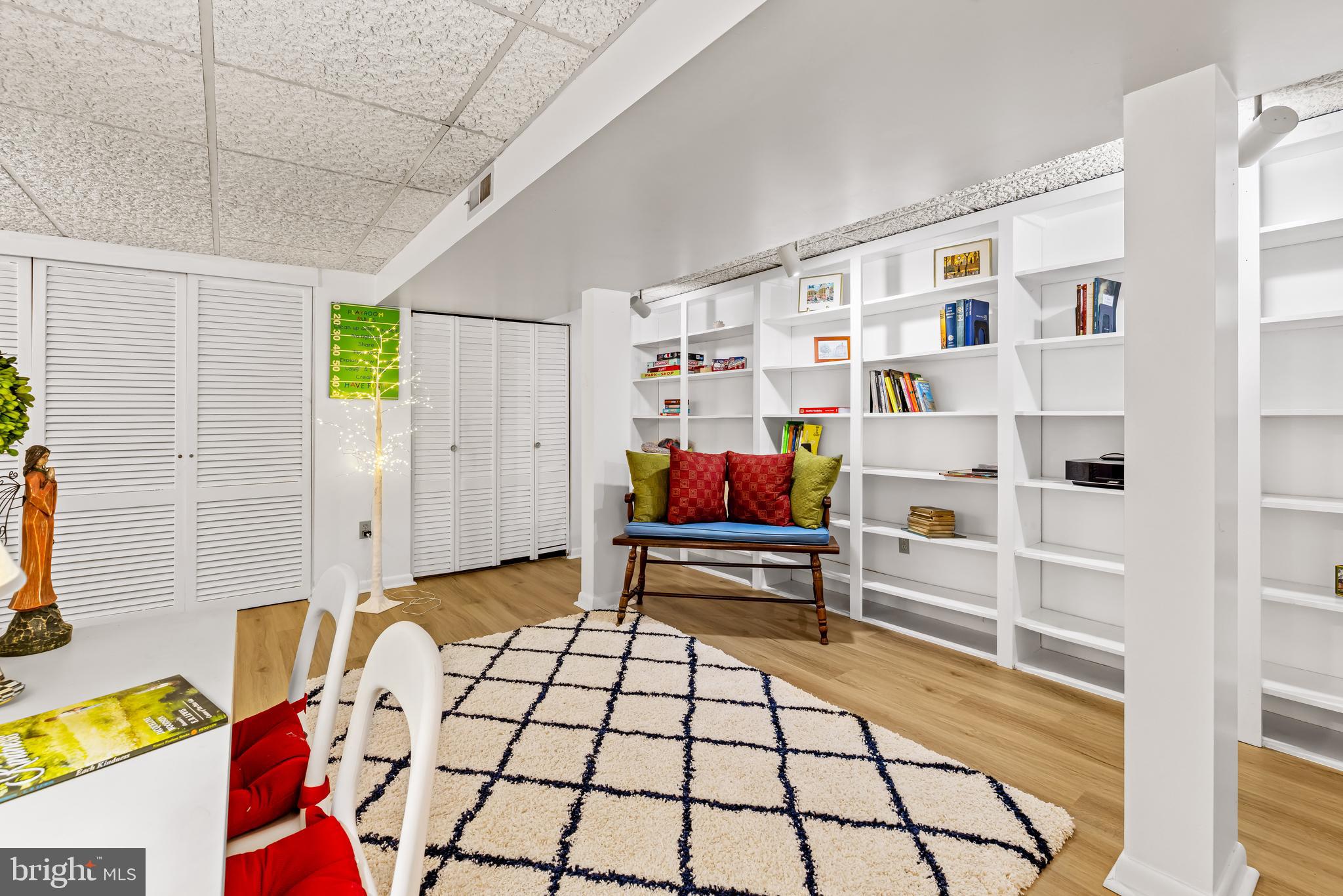 200 Purlington Road Lutherville-Timonium, MD 21093 - Photo 35 of 50 a bedroom with furniture and a book shelf