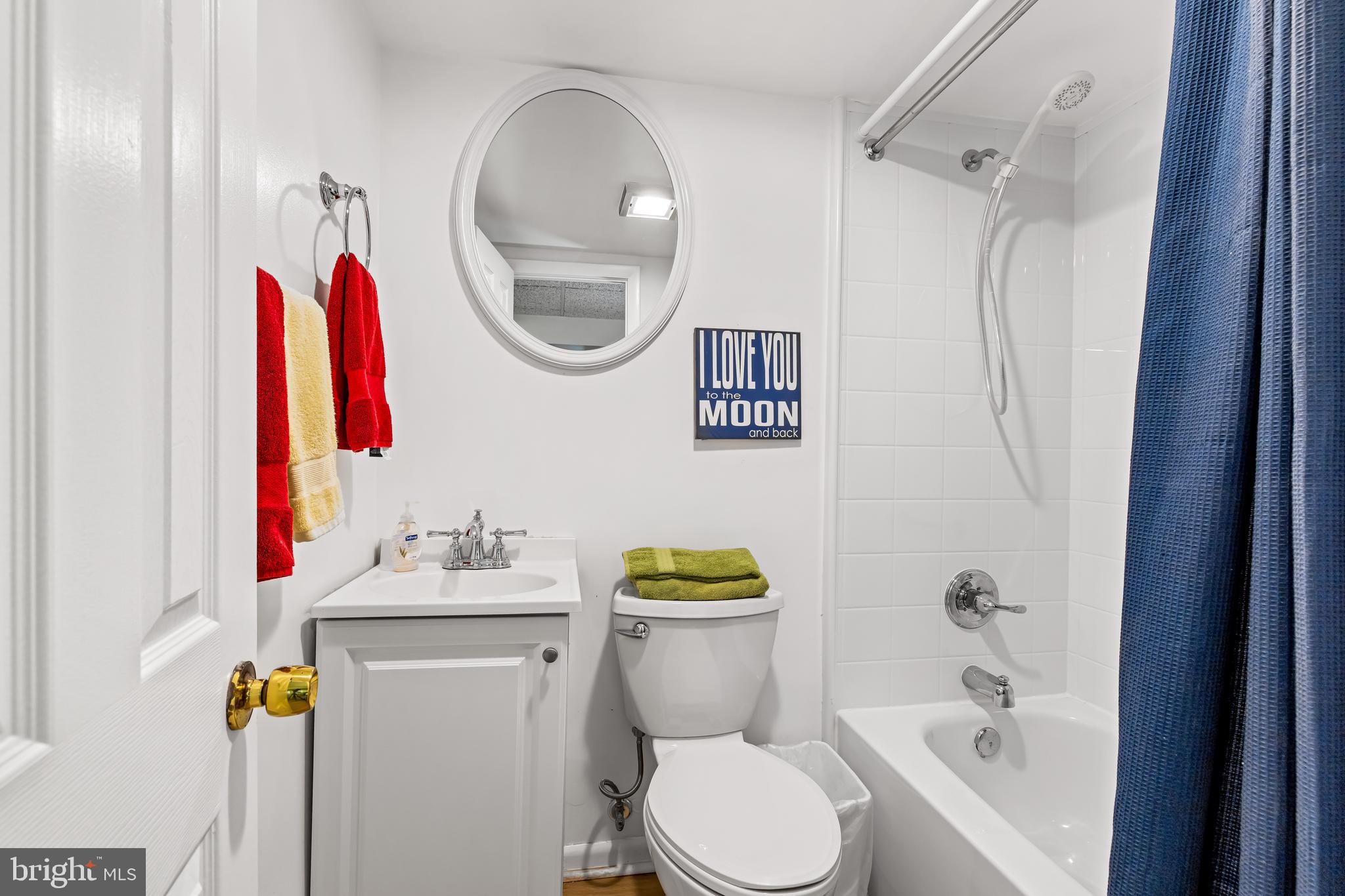 200 Purlington Road Lutherville-Timonium, MD 21093 - Photo 38 of 50 a bathroom with a sink a toilet and a mirror