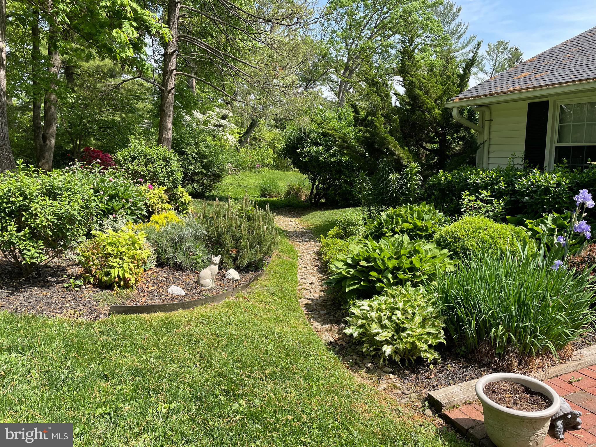 200 Purlington Road Lutherville-Timonium, MD 21093 - Photo 46 of 50 a view of a backyard with potted plants and large trees