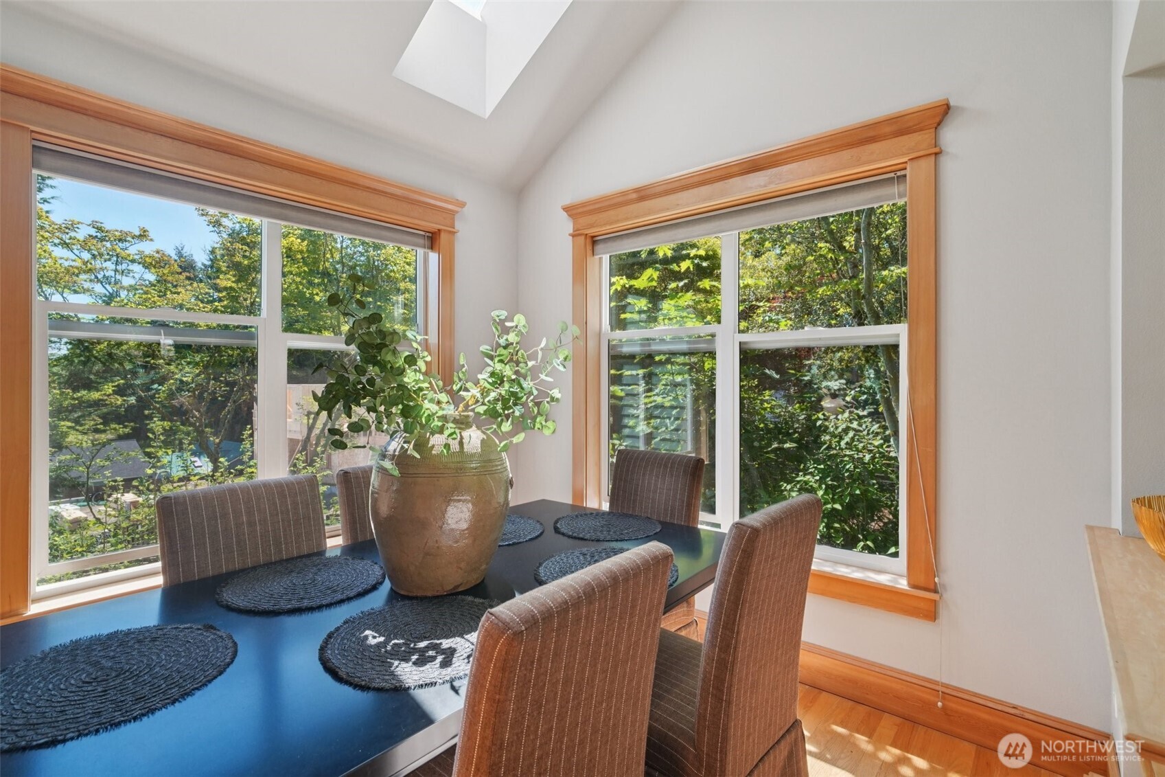 23623 20th Avenue West Bothell, WA 98021 - Photo 11 of 40 a view of a dining room with furniture wooden floor and a potted plant