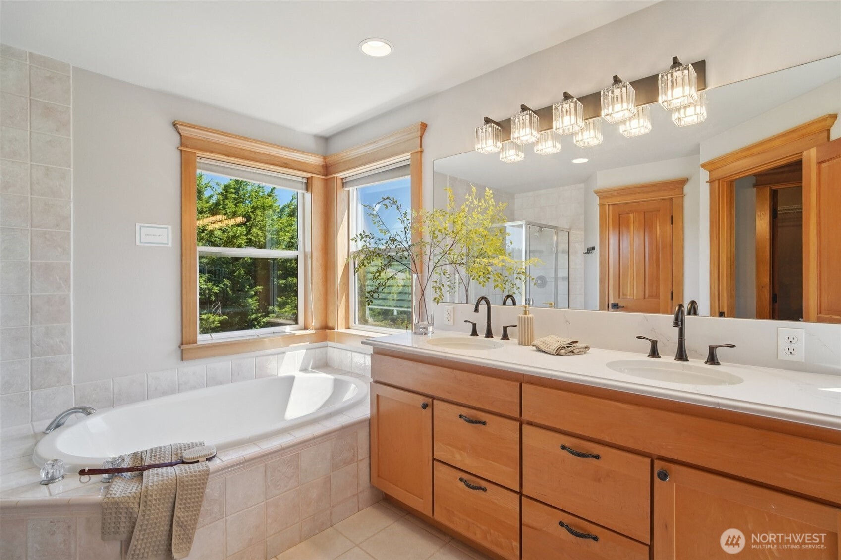 23623 20th Avenue West Bothell, WA 98021 - Photo 18 of 40 a bathroom with a tub sink and mirror