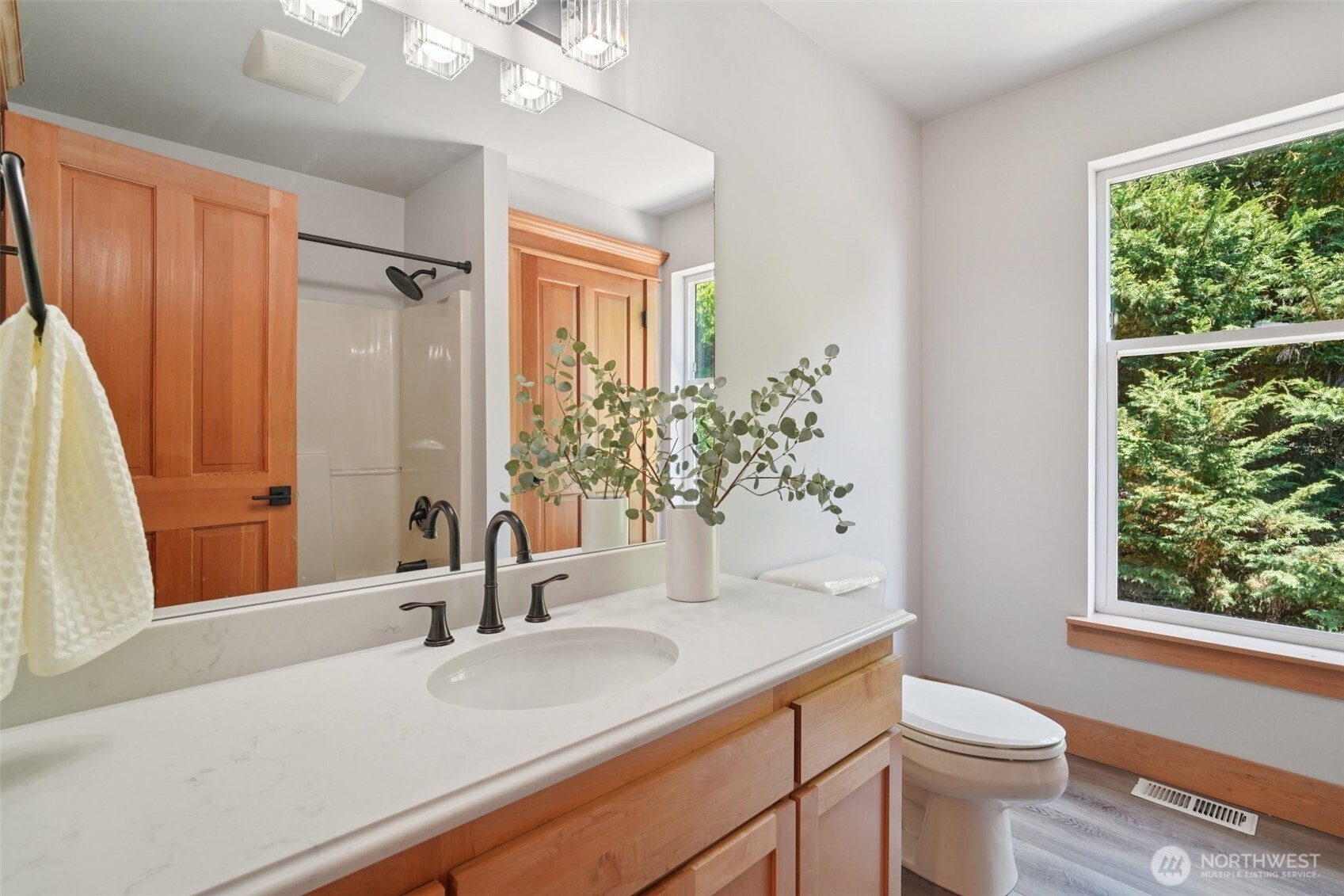 23623 20th Avenue West Bothell, WA 98021 - Photo 23 of 40 a bathroom with a sink a toilet a window and shower