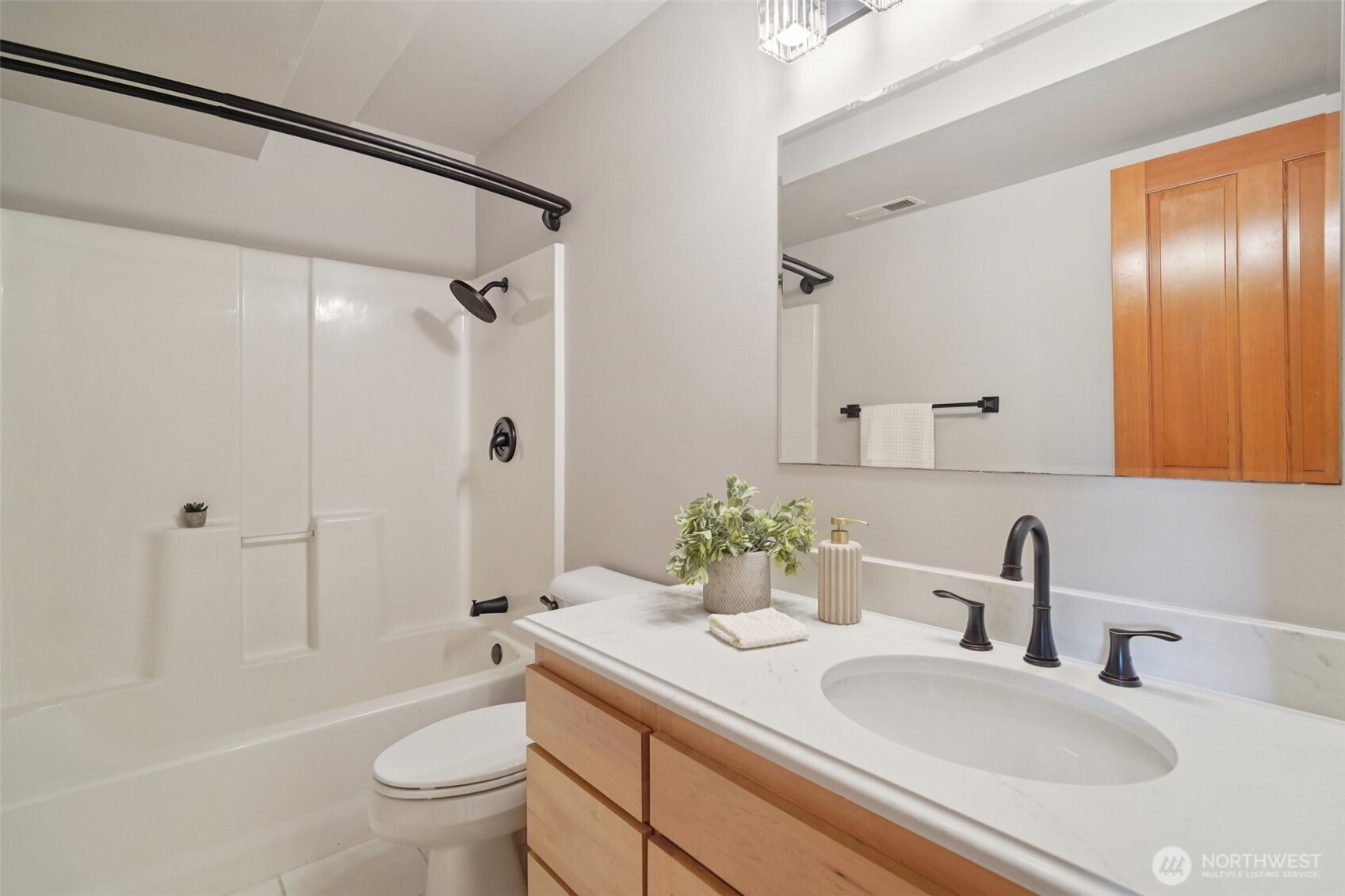 23623 20th Avenue West Bothell, WA 98021 - Photo 27 of 40 a bathroom with a granite countertop sink toilet and shower
