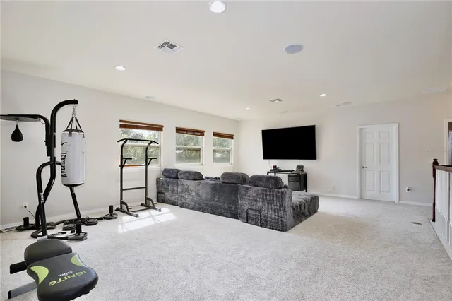 a bathroom with a sink double vanity granite and a mirror