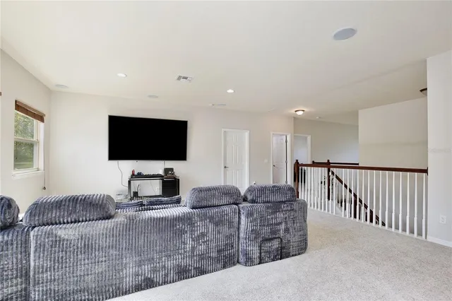 a kitchen with a sink and refrigerator