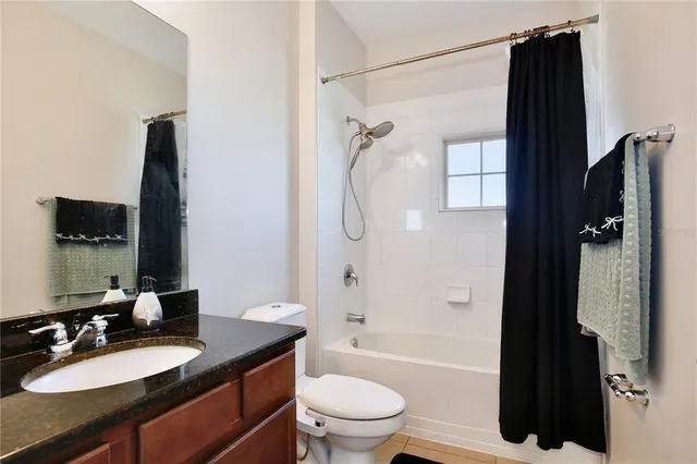 a view of a bedroom and a bathroom