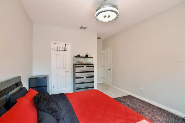 a building outdoor space with patio furniture and potted plants