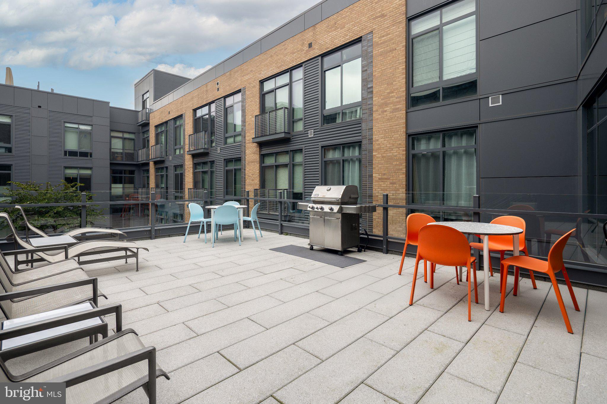 525 Southwest Water Street Southwest, Unit 404 Washington, DC 20024 - Photo 30 of 82 Stylish terrace with modern seating.