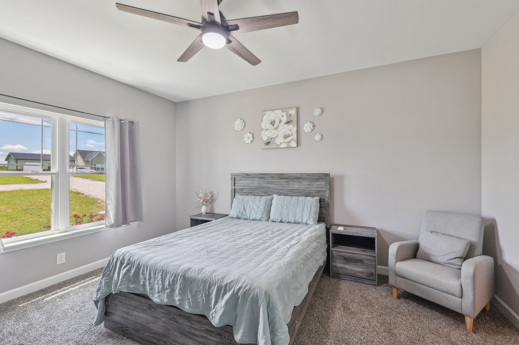 1219 Oak Grove Road Dickson, TN 37055 - Photo 20 of 52 a bedroom with a large bed and a window