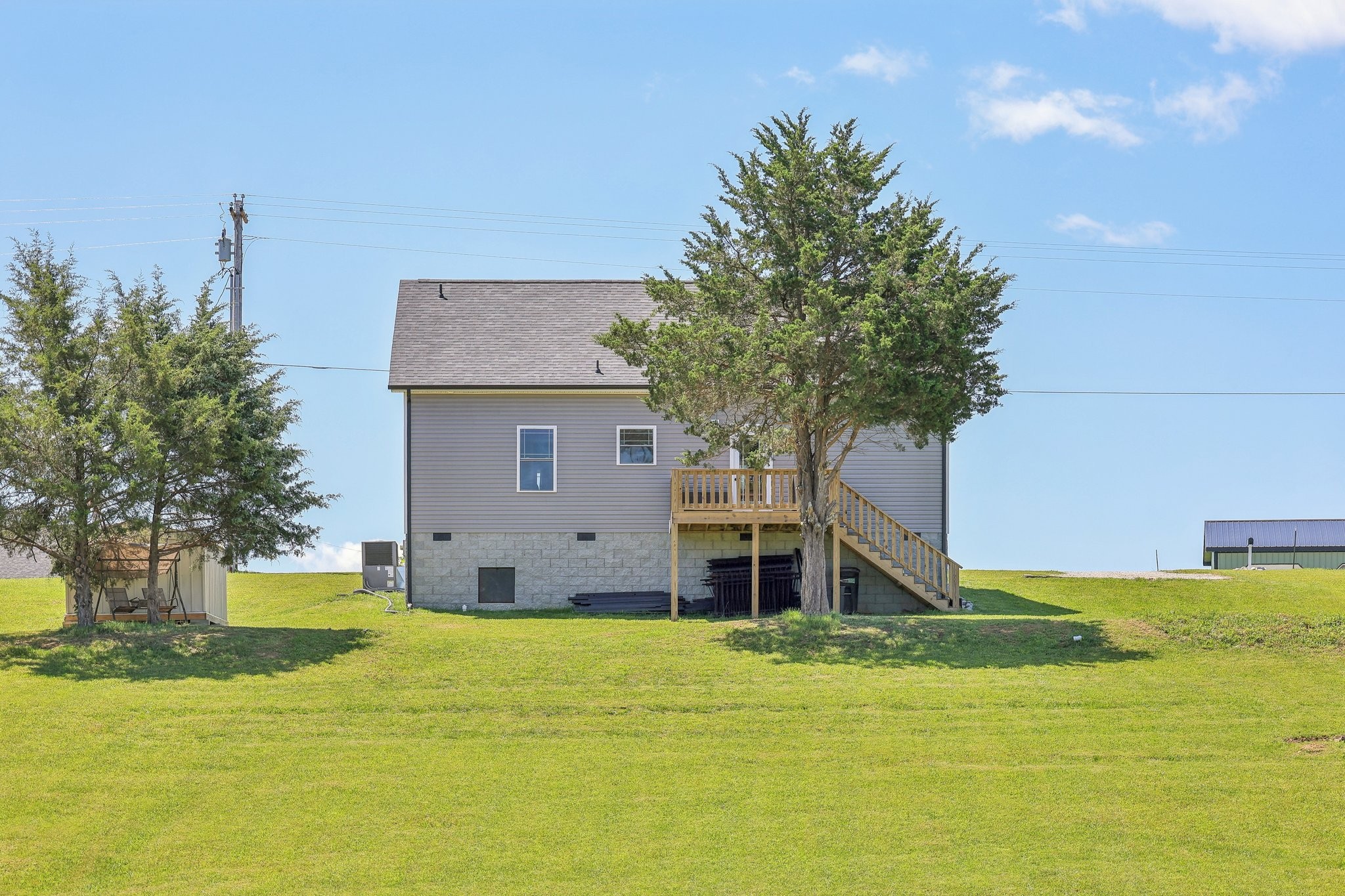 1219 Oak Grove Road Dickson, TN 37055 - Photo 46 of 52 a view of a house with pool and trees