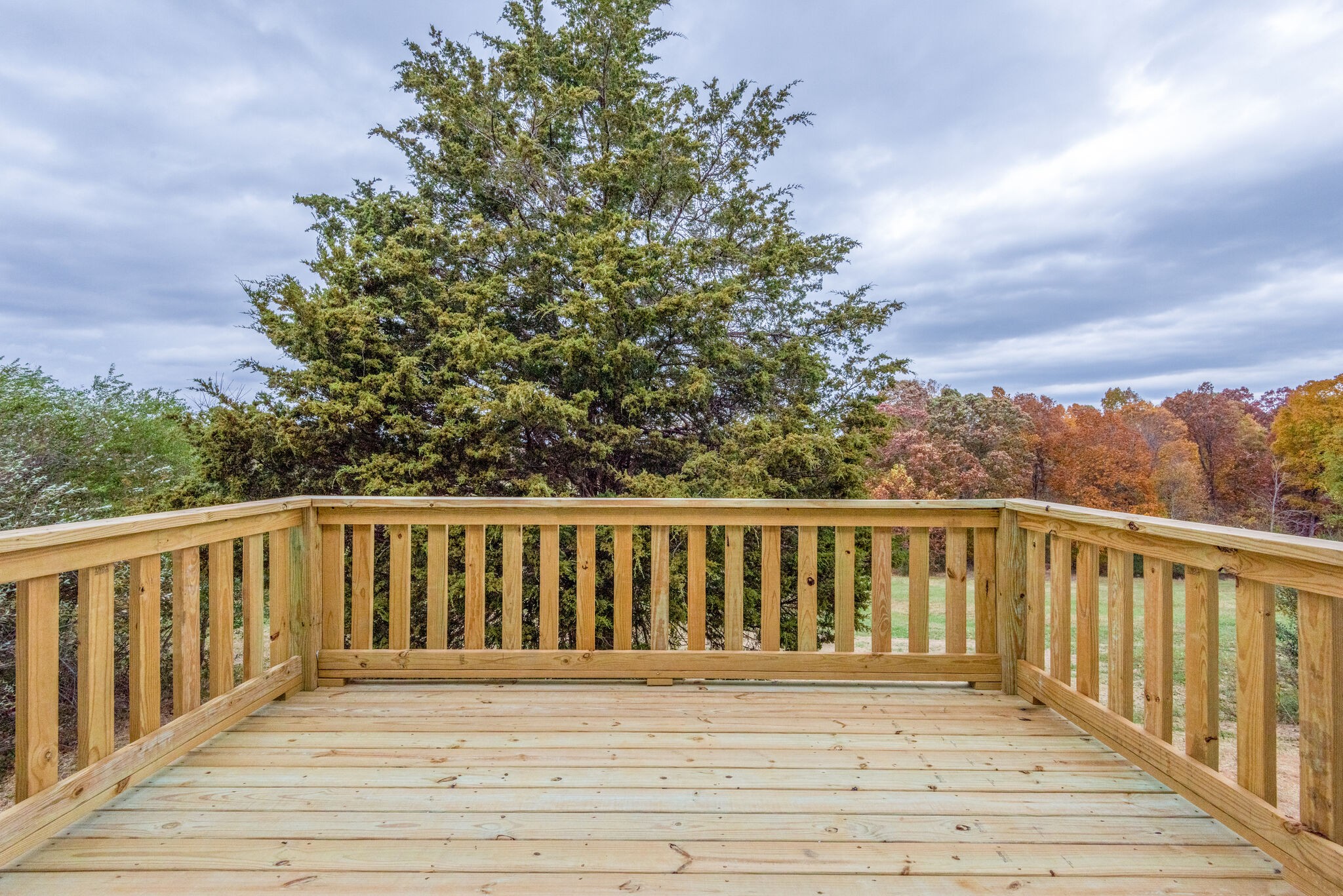 1219 Oak Grove Road Dickson, TN 37055 - Photo 5 of 52 a balcony with wooden floor and fence