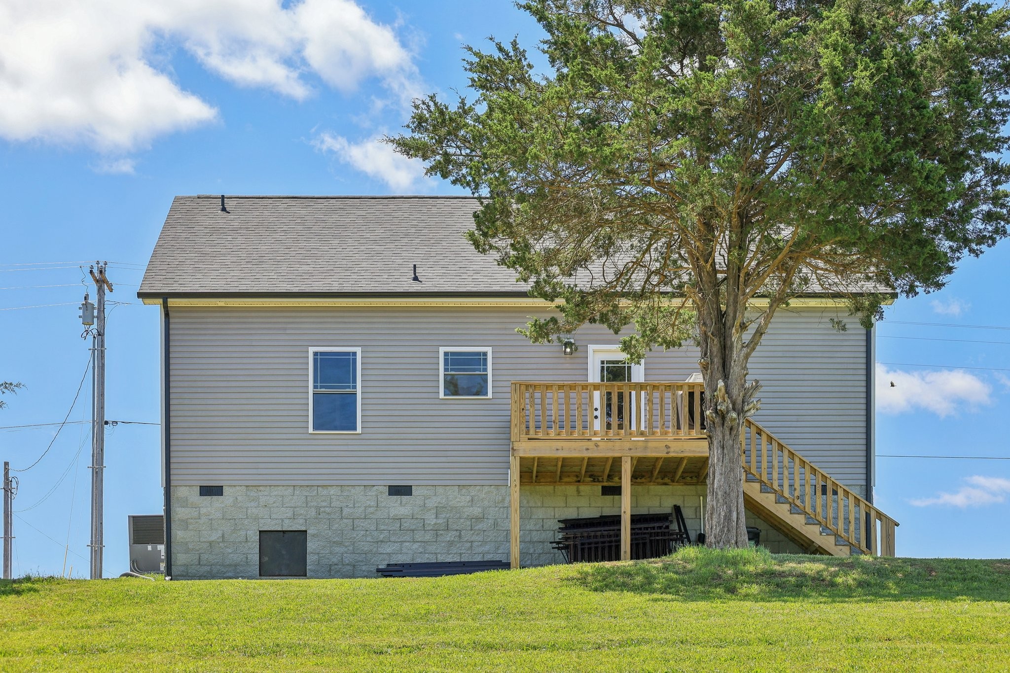 1219 Oak Grove Road Dickson, TN 37055 - Photo 52 of 52 a view of a house with a backyard