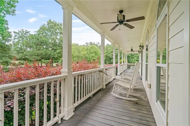 a view of a backyard with table and chairs