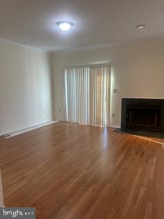 15 Fountayne Court Princeton, NJ 08540 - Photo 17 of 38 an empty room with wooden floor and fireplace