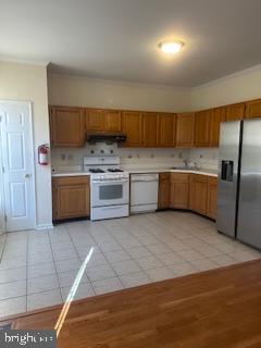 15 Fountayne Court Princeton, NJ 08540 - Photo 3 of 38 a kitchen with stainless steel appliances granite countertop a sink and a stove