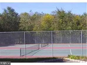 a view of a wooden fence