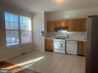 15 Fountayne Court Princeton, NJ 08540 - Photo 5 of 38 a kitchen with a stove sink and cabinets