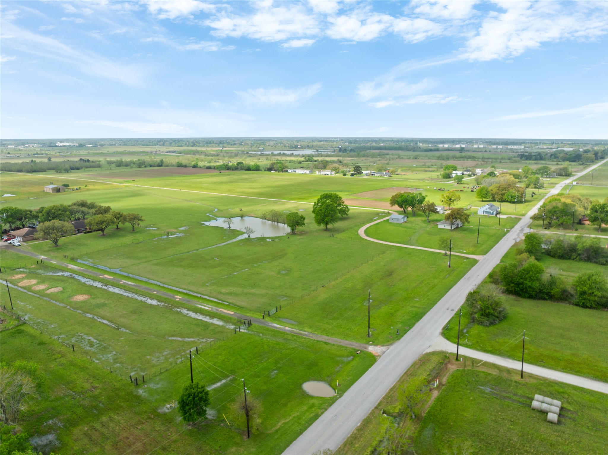 34611 Owens Road Hempstead, TX 77445 - Photo 22 of 25 a view of an outdoor space and tennis court
