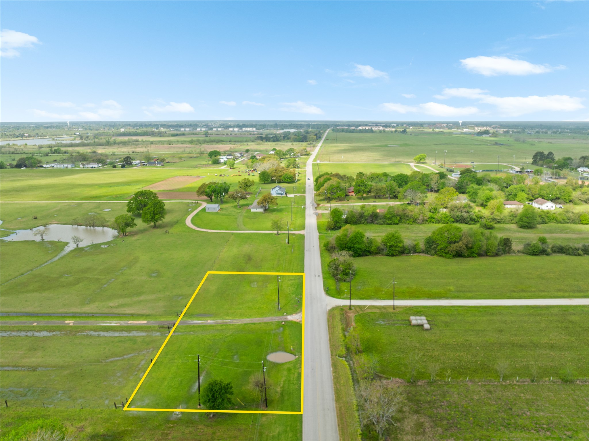 34611 Owens Road Hempstead, TX 77445 - Photo 23 of 25 a view of an outdoor space and tennis court