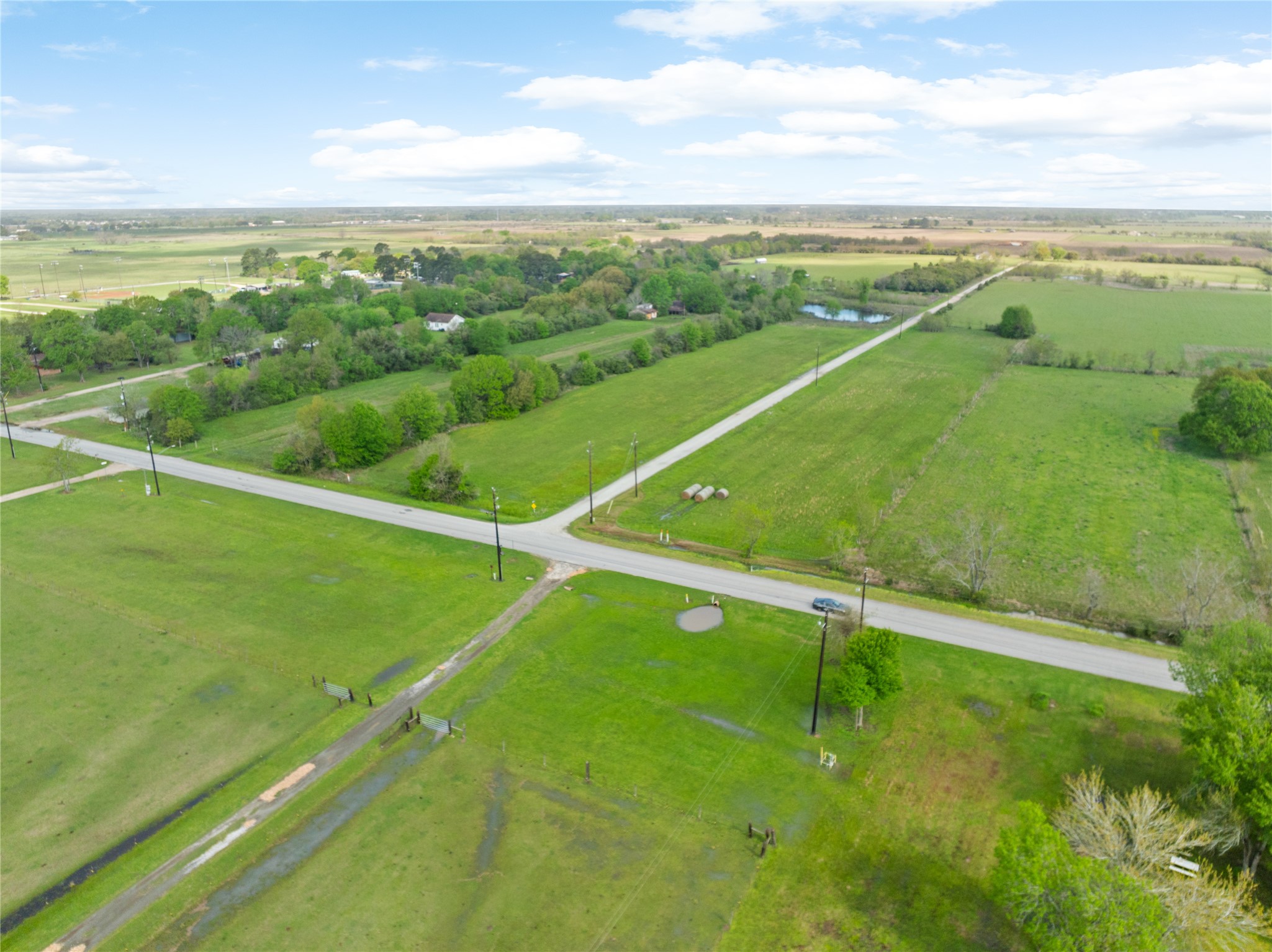 34611 Owens Road Hempstead, TX 77445 - Photo 9 of 25 a view of a green field with an ocean