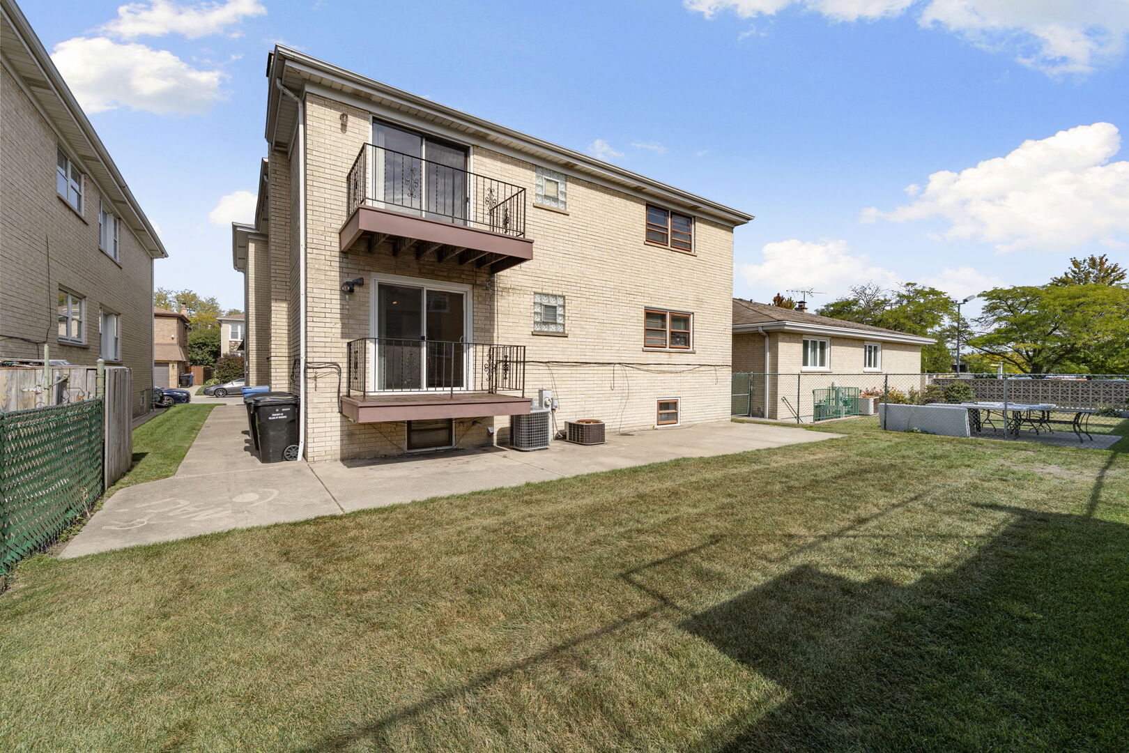 8427 West Windsor Avenue, Unit 1 Chicago, IL 60656 - Photo 28 of 34 a front view of a house with garden