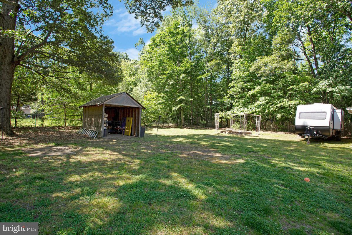 6600 Ashland Road La Plata, MD 20646 - Photo 35 of 40 a front view of a house with a garden