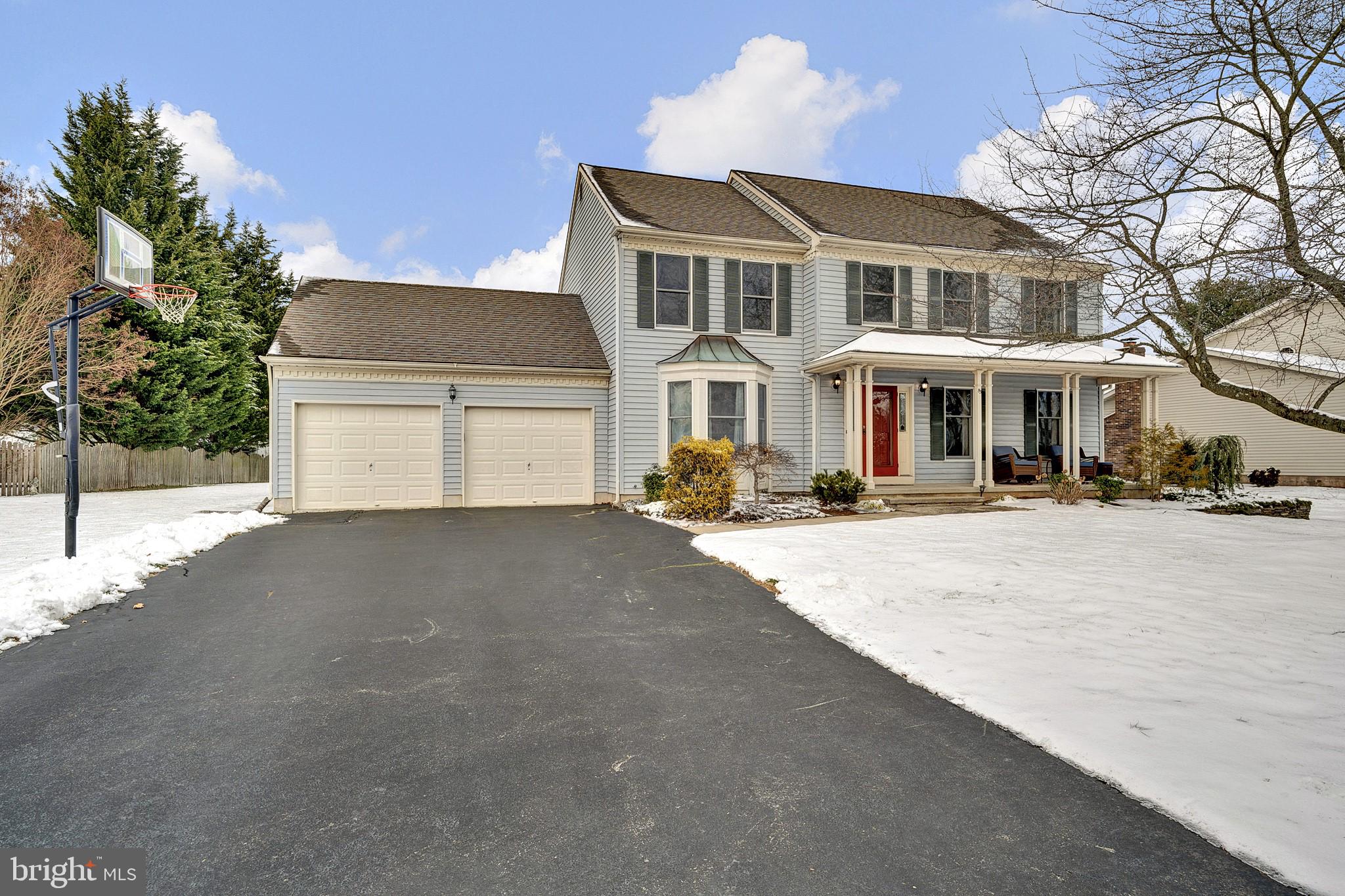115 Robin Drive Hamilton, NJ 08619 - Photo 3 of 56 View of house with snowfall