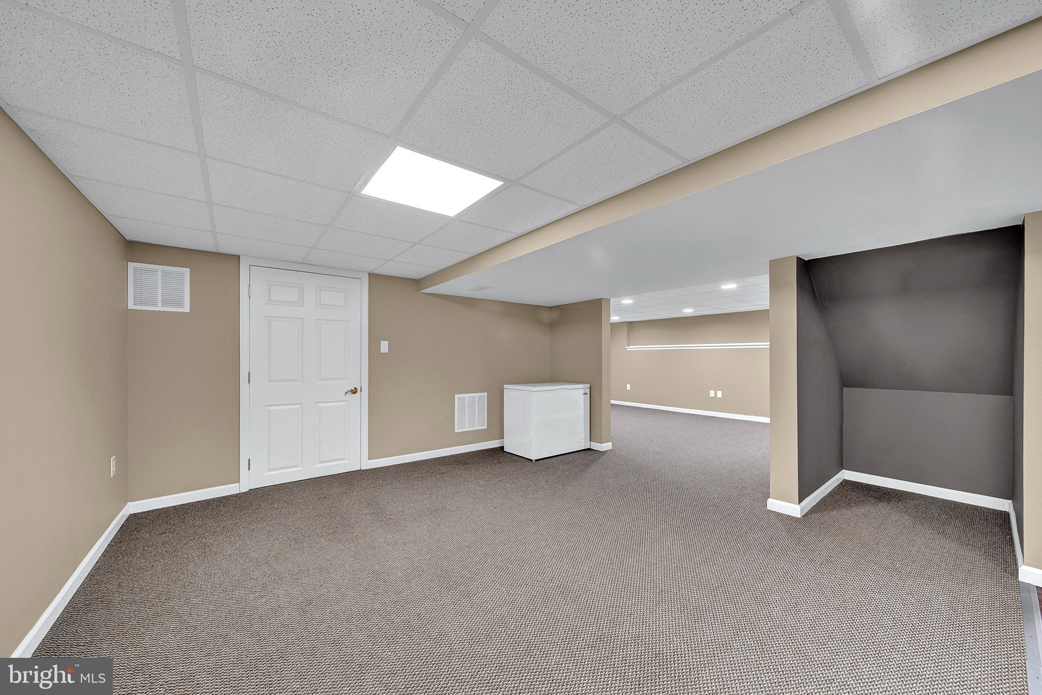 115 Robin Drive Hamilton, NJ 08619 - Photo 44 of 56 Door leads to unfinished utility area