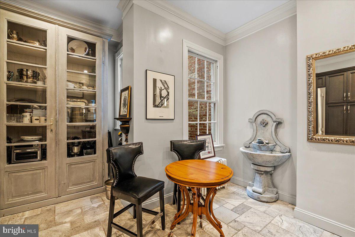 2815 Q Street Northwest Washington, DC 20007 - Photo 11 of 30 a room with furniture and windows