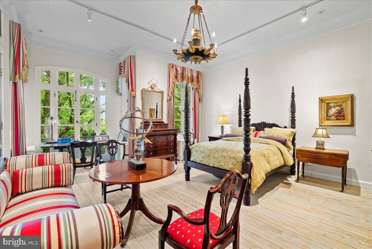 2815 Q Street Northwest Washington, DC 20007 - Photo 13 of 30 a bedroom with furniture and a large window