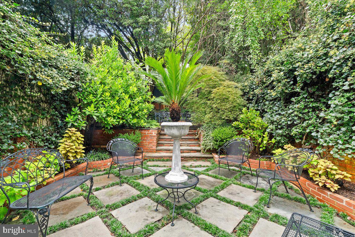 2815 Q Street Northwest Washington, DC 20007 - Photo 27 of 30 a view of a chairs and table in a patio