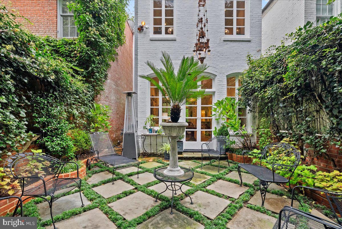 2815 Q Street Northwest Washington, DC 20007 - Photo 28 of 30 a view of a chairs and table in a patio