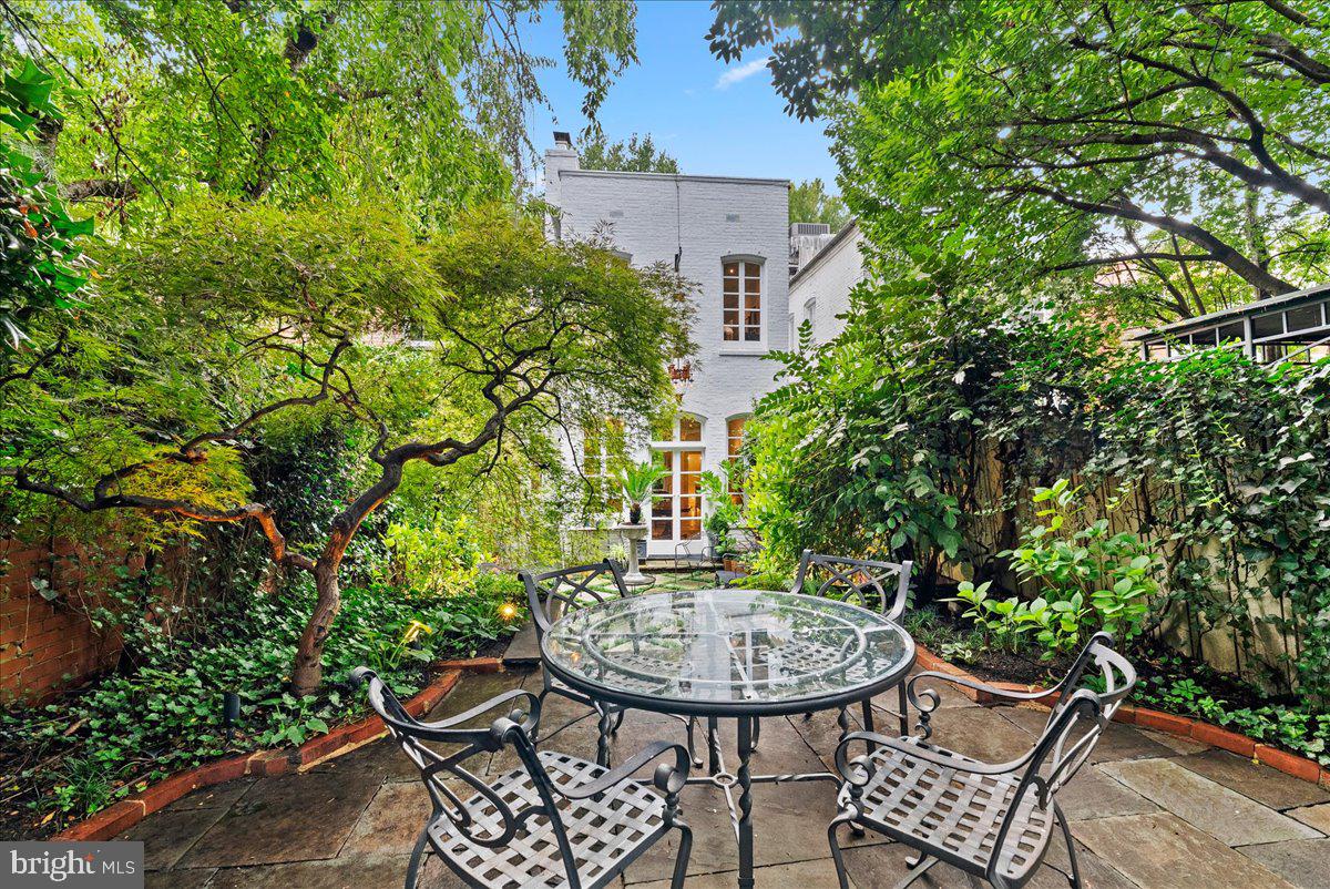 2815 Q Street Northwest Washington, DC 20007 - Photo 30 of 30 a view of a chair and table in backyard