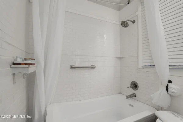 a bathroom with a bathtub