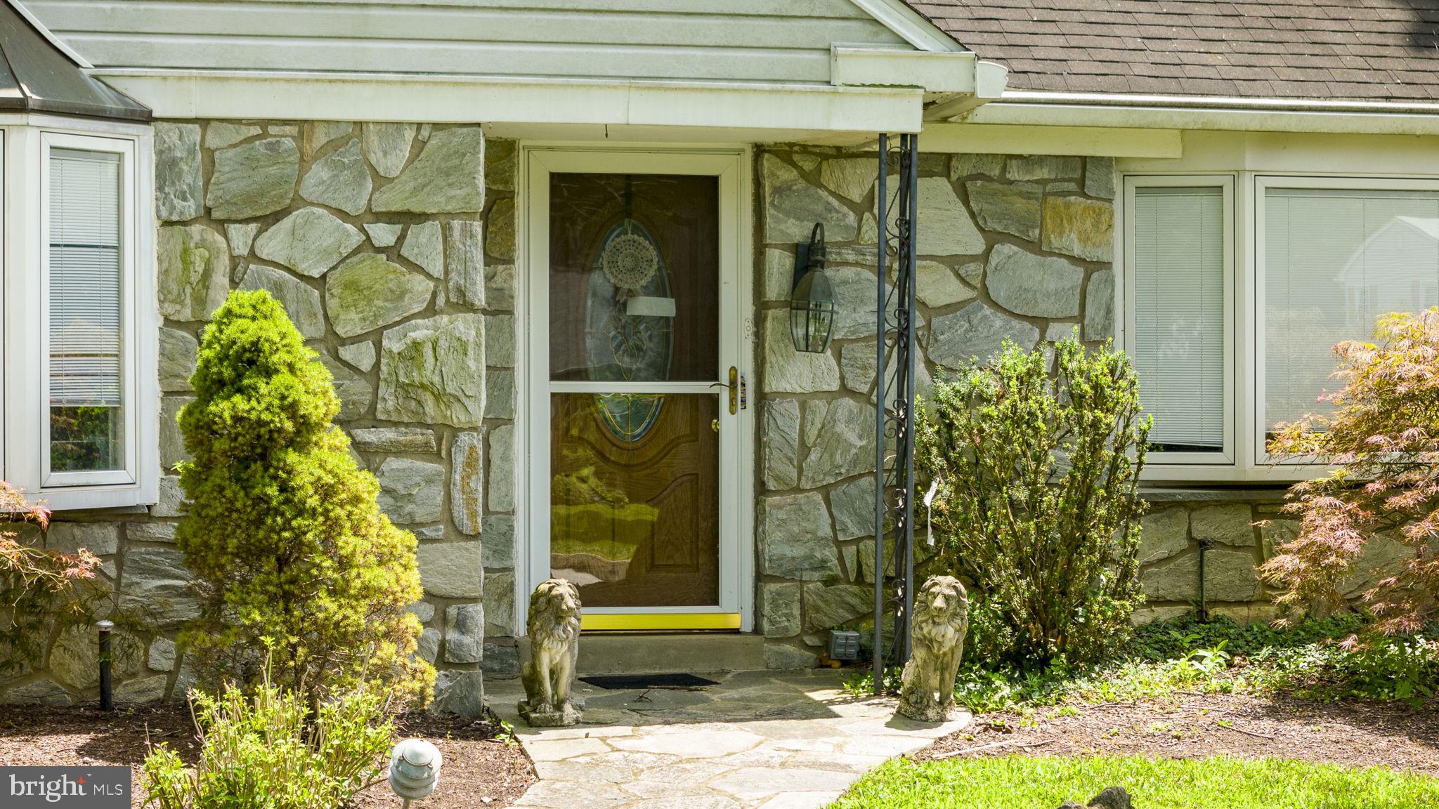 220 Old State Road Berwyn, PA 19312 - Photo 17 of 36 a couple of potted plants in front of door
