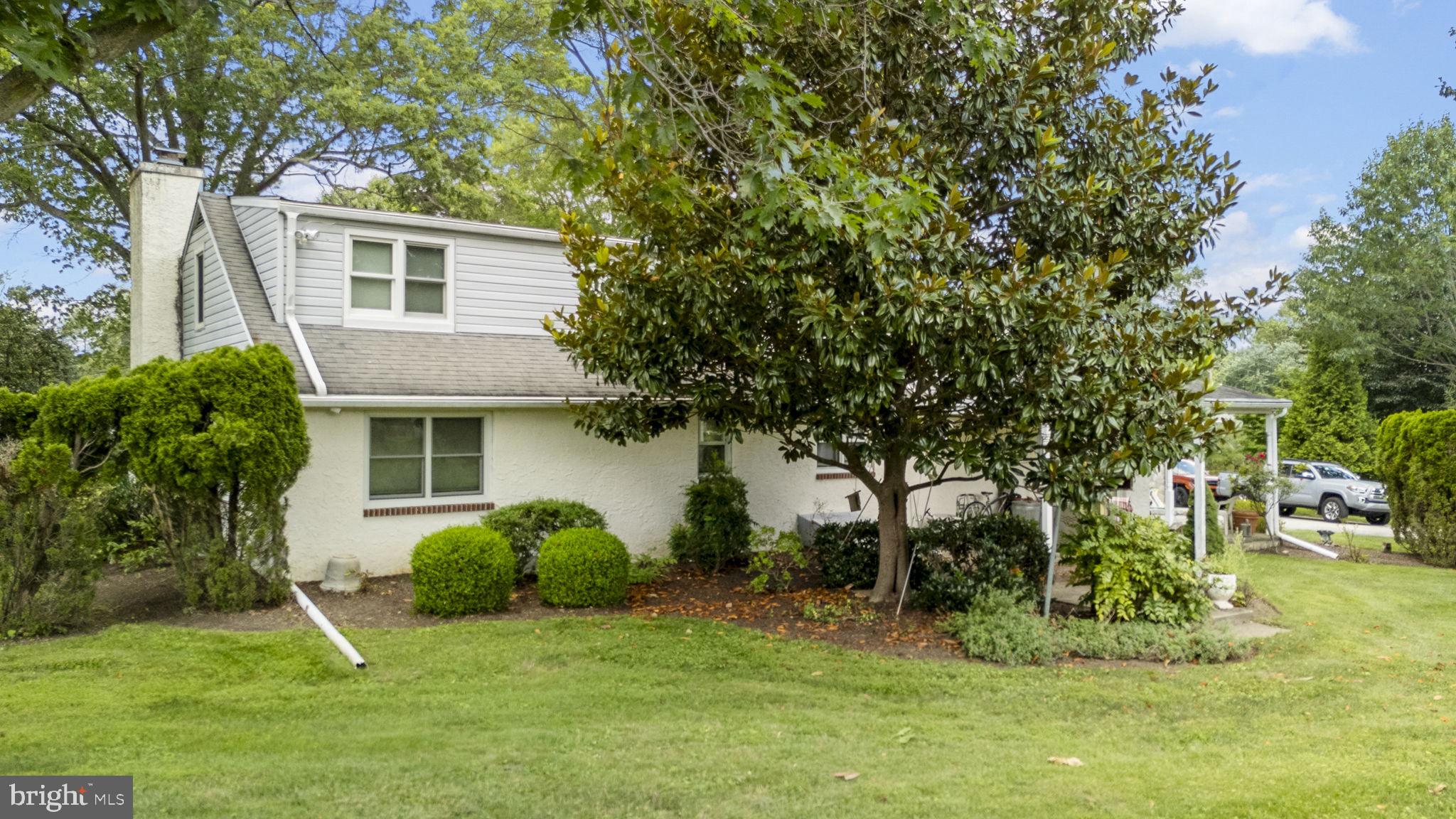 220 Old State Road Berwyn, PA 19312 - Photo 19 of 36 a view of a house with a backyard
