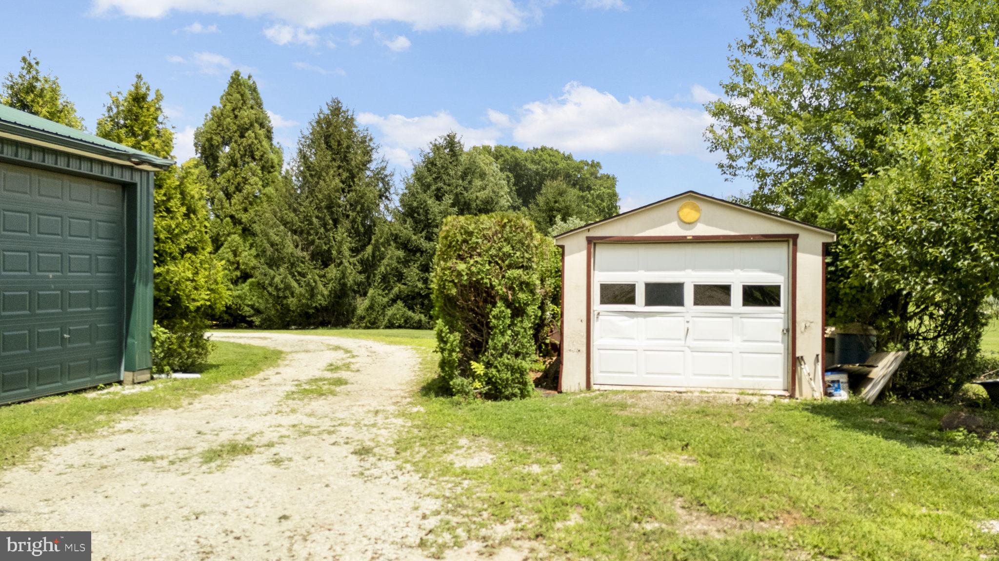 220 Old State Road Berwyn, PA 19312 - Photo 24 of 36 a front view of a house with a yard