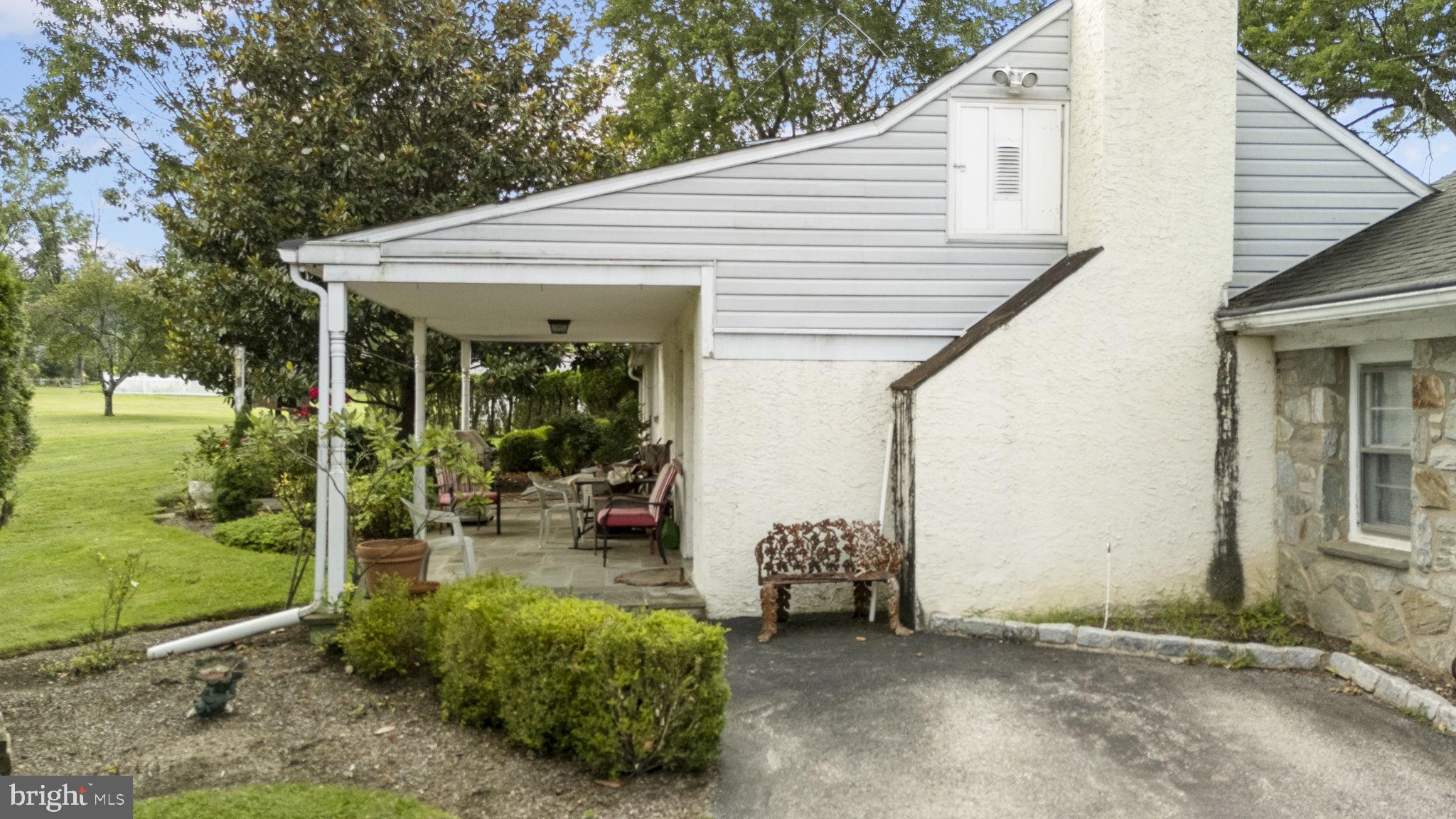 220 Old State Road Berwyn, PA 19312 - Photo 27 of 36 a view of a house with backyard porch and sitting area