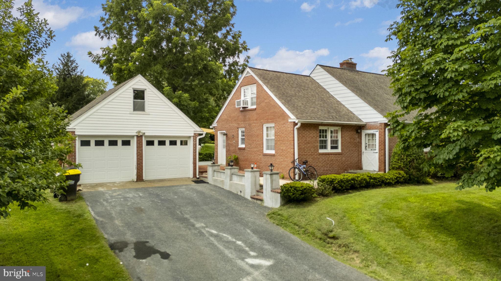 220 Old State Road Berwyn, PA 19312 - Photo 28 of 36 a view of a house with garden and yard