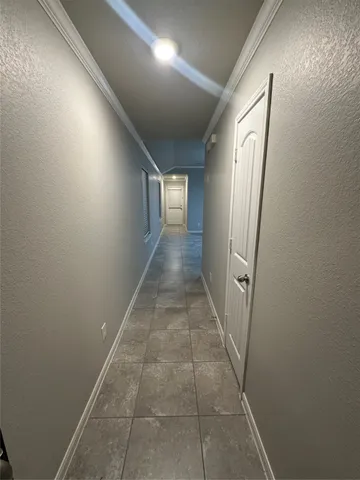 a view of hallway with stairs