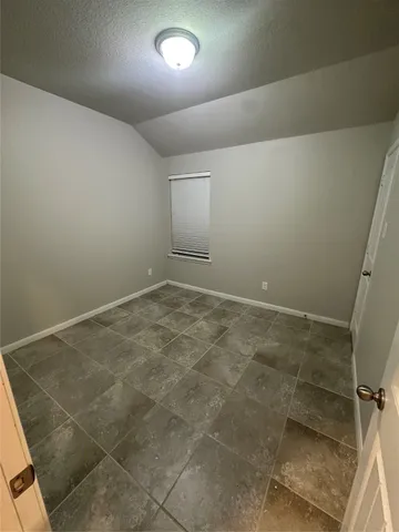 en empty room with windows