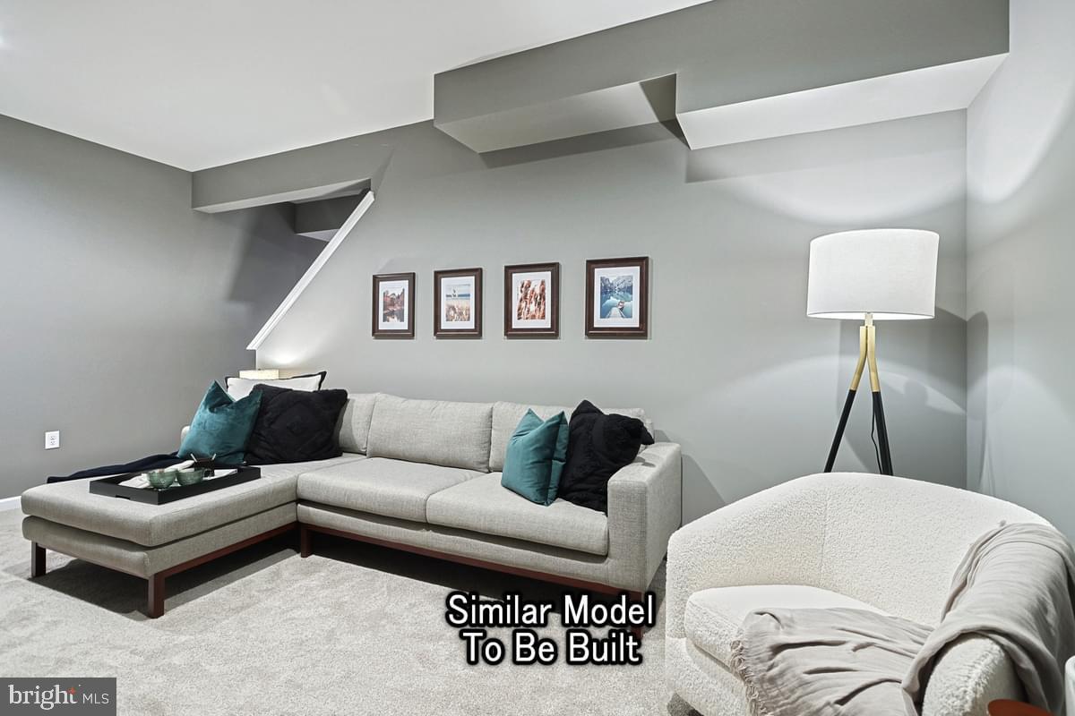 White Oak Plan At Hills Spring Grove, PA 17362 - Photo 21 of 42 a living room with furniture