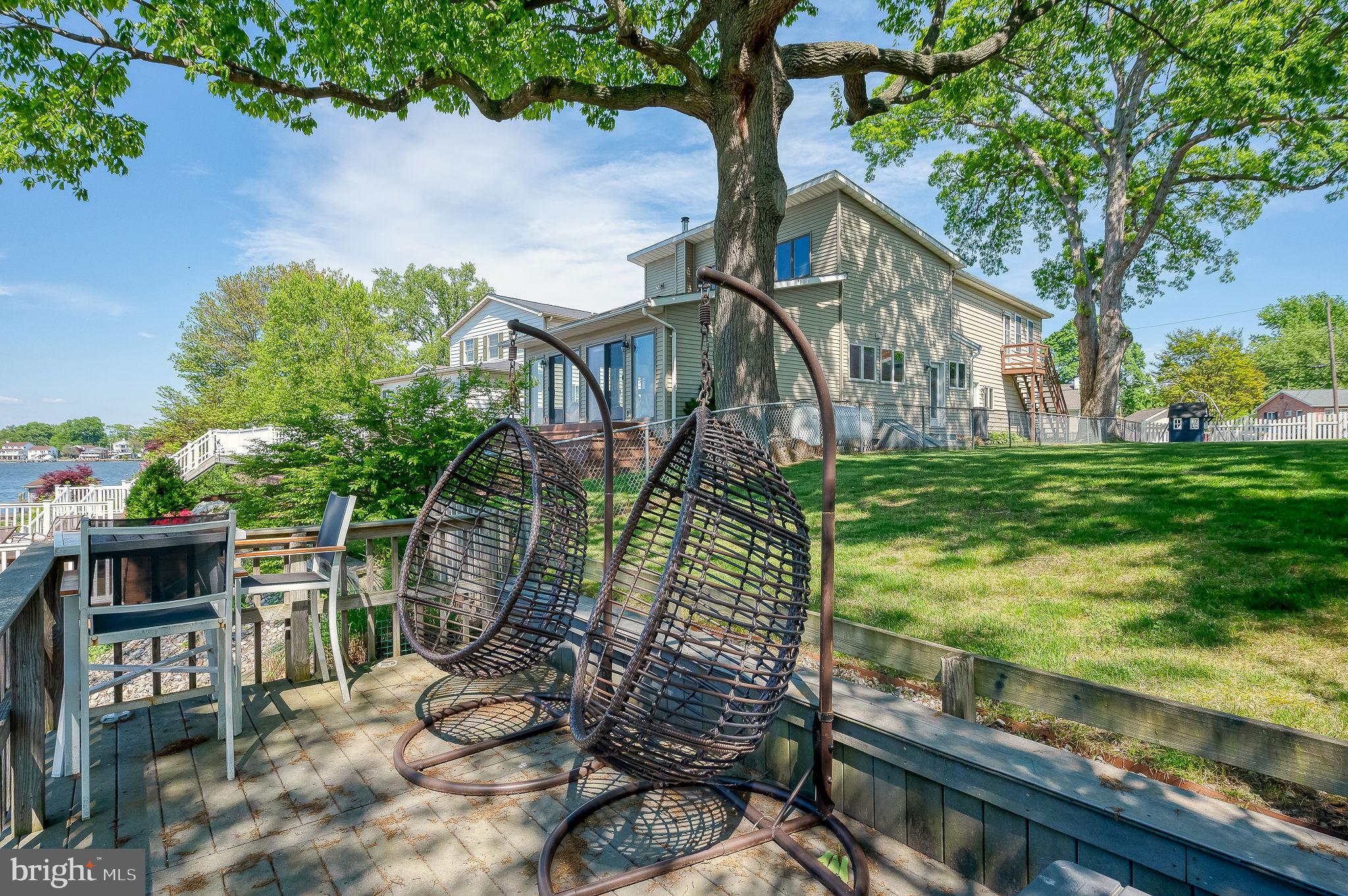 2222 Monocacy Road Essex, MD 21221 - Photo 45 of 70 Serene lakeside retreat with swings.