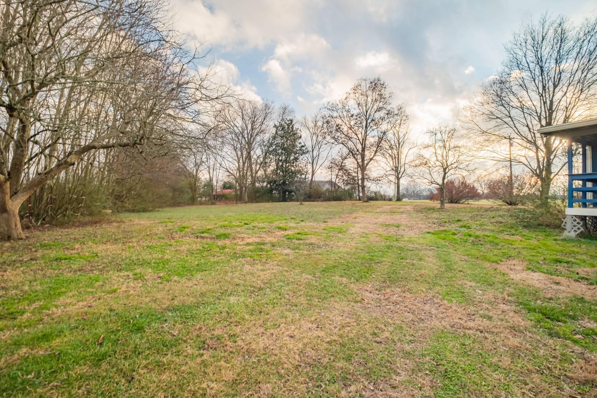 3324 Fredonia Road Manchester, TN 37355 - Photo 11 of 42 a view of a yard with a house in the background