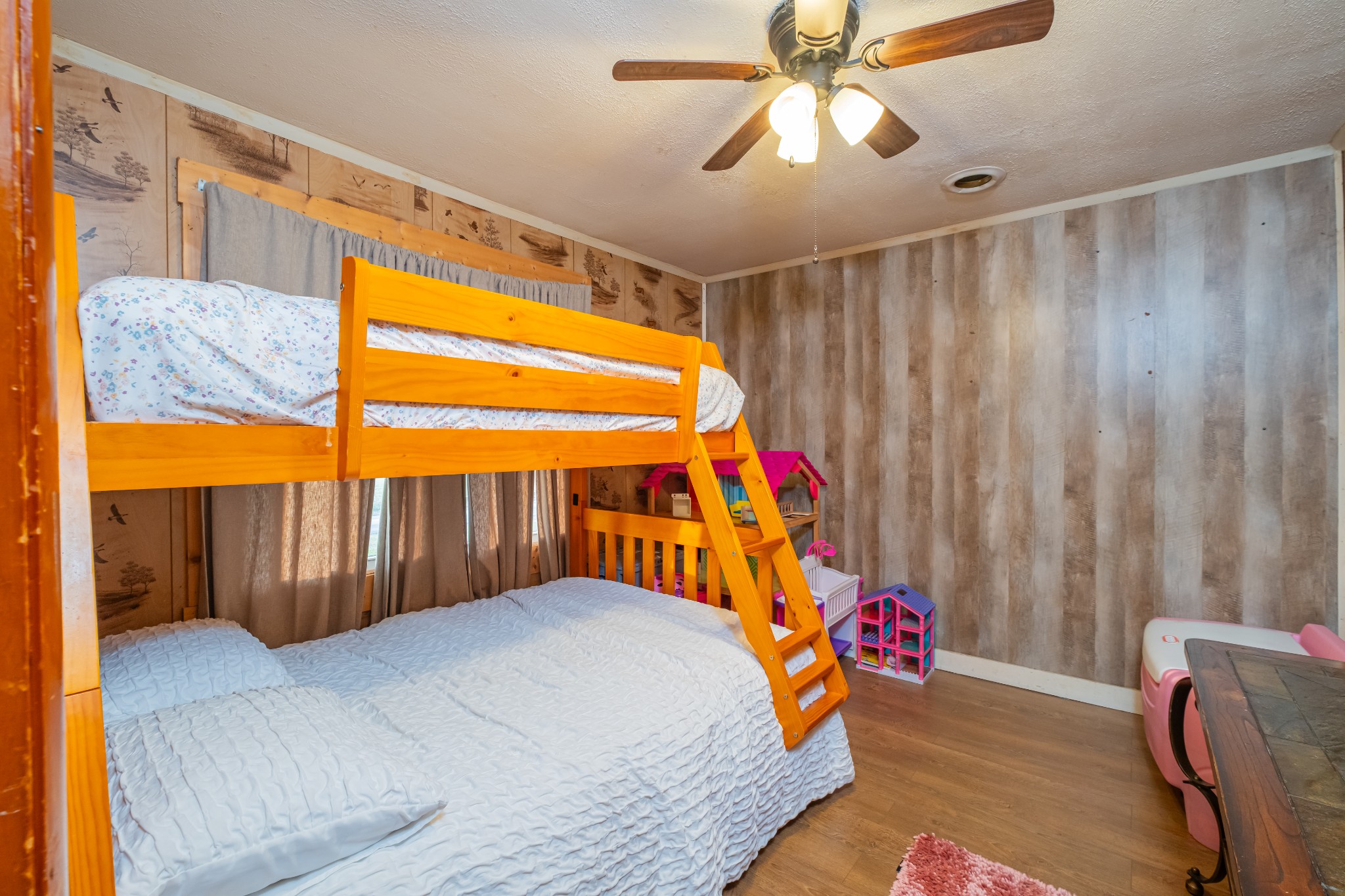 3324 Fredonia Road Manchester, TN 37355 - Photo 18 of 42 a bedroom with a bed and a chandelier