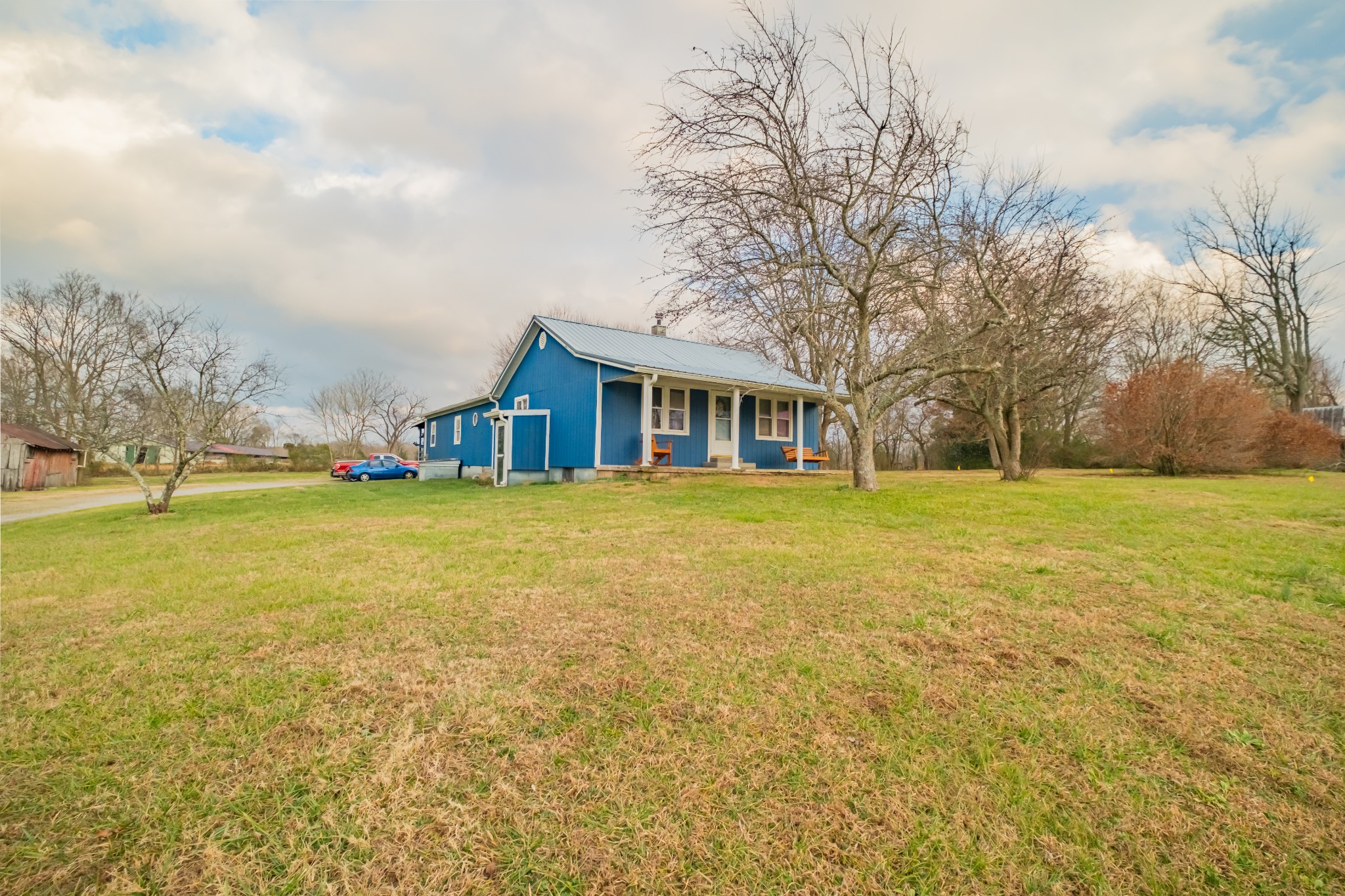 3324 Fredonia Road Manchester, TN 37355 - Photo 4 of 42 a view of house with an outdoor space and seating area